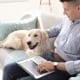 man laptop dog leading virtual teams