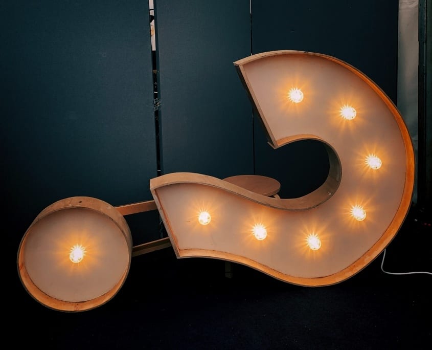 1 sideways question mark jon-tyson-hhq1Lxtuwd8-unsplash question decisions